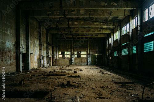 Old broken empty abandoned industrial building interior