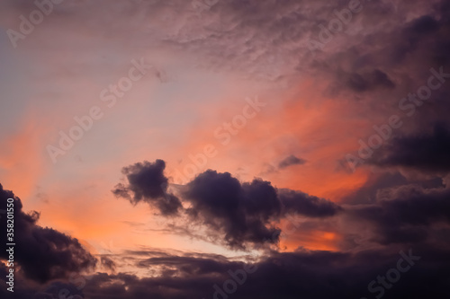 Dramatic sky with dark storm clouds and red sunset clearance © Tatiana Sidorova