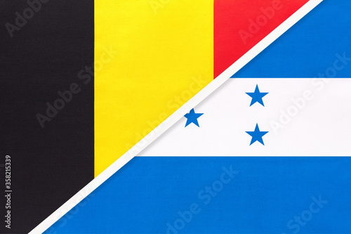 Belgium and Honduras, symbol of two national flags from textile. Championship between two countries.