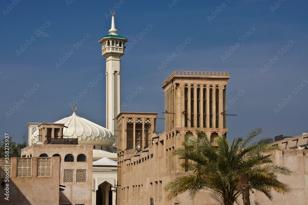 Mosque and wind towers in Bastakia Quarter of Old Dubai, United Arab Emirates