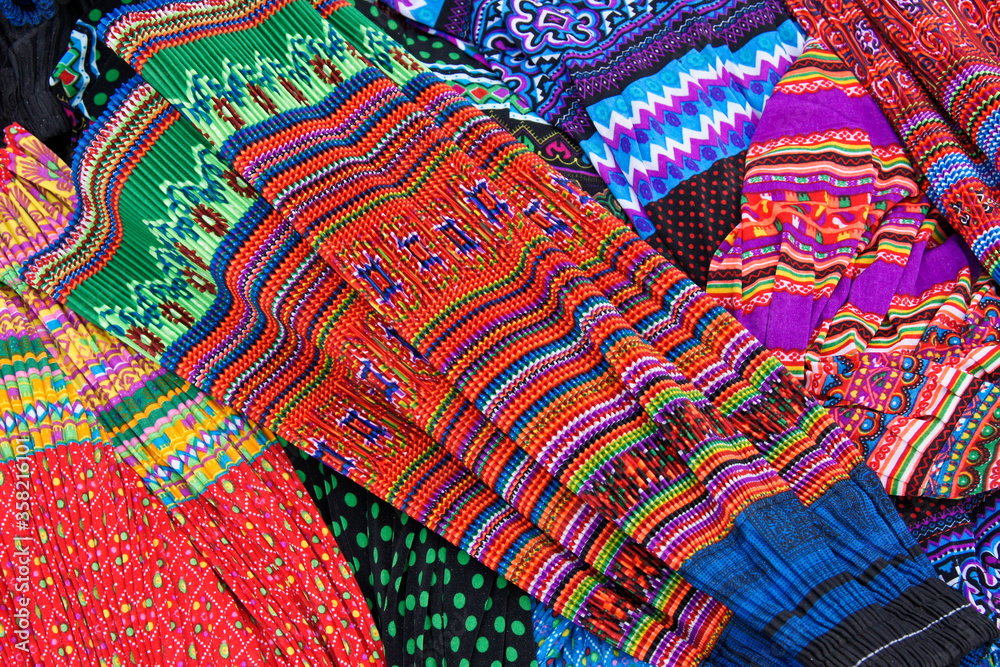 Pleated skirts worn by Flower Hmong women for sale in market, Sapa (Sa Pa), Vietnam Pleated skirts worn by Flower Hmong women for sale in market, Sapa (Sa Pa), Vietnam