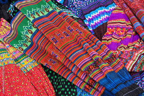 Cuadro en lienzo Pleated skirts worn by Flower Hmong women for sale in market, Sapa (Sa Pa), Viet