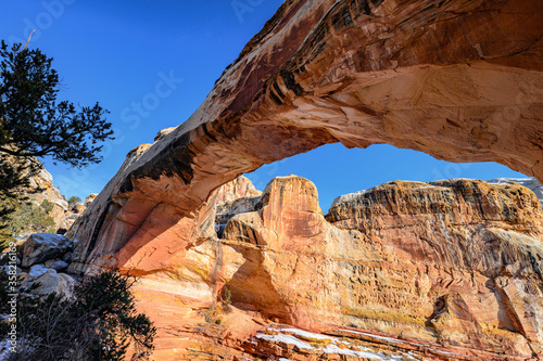 Hickman Natural Bridge covered by snow at Capitol Reef National Park photo