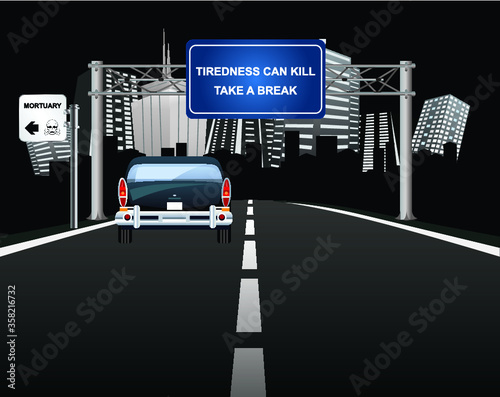 Tiredness can kill warning sign to motorist on overhead road gantry with vehicle entering generic city 