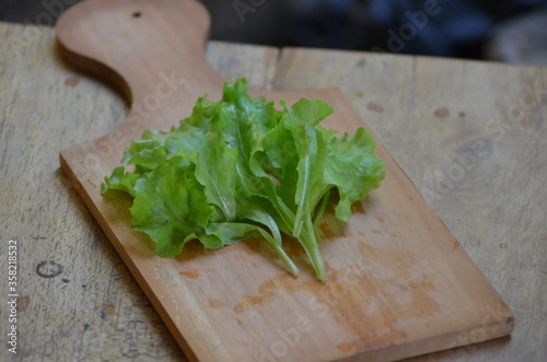 chopped lettuce on a chopping board