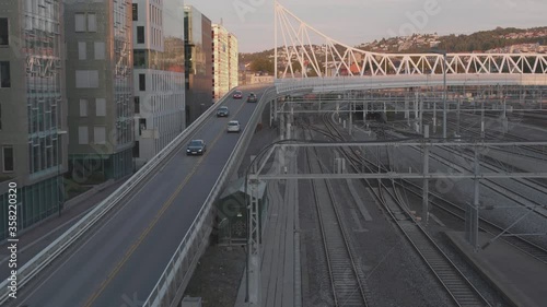 Static shot of cars driving on Nordenga bridge by the central train station in Oslo, Norway photo