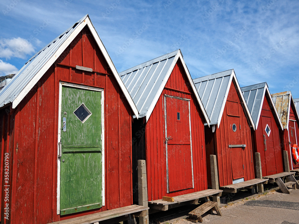 Beautiful red fishing huts on the coast Beautiful red fishing huts on the coast