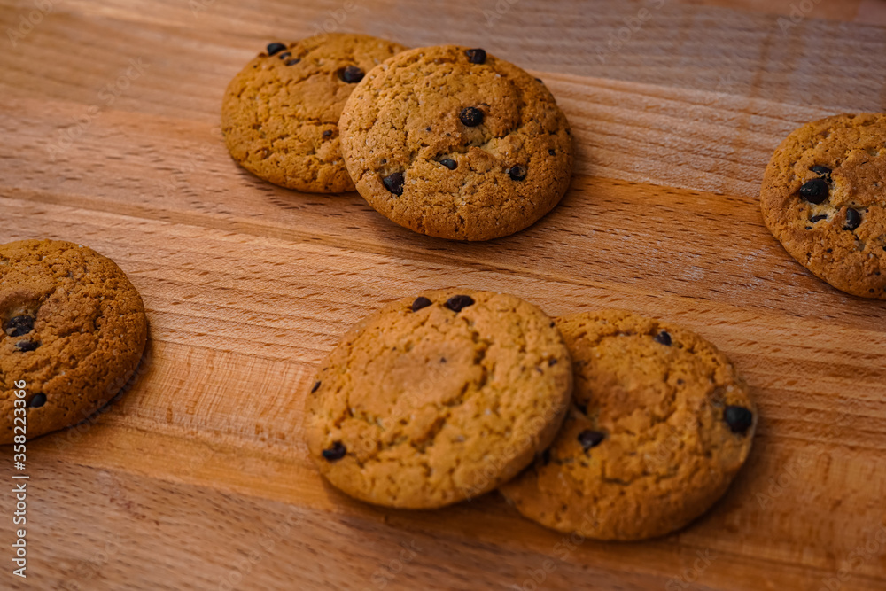 Oatmeal cookies on a table with a wooden texture Oatmeal cookies on a table with a wooden texture