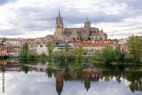 Salamanca city view from the bridge with reflection from the river. 