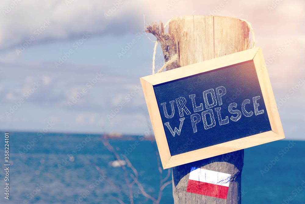 Strand und Tafel mit dem Slogan Urlaub in Polen foto de Stock Adobe Stock