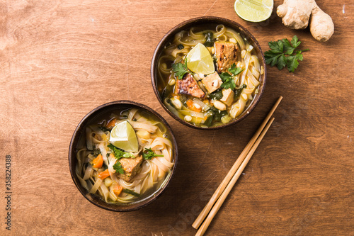 Miso Ramen Asian noodles soup with tempeh or tempe in a bowl. Health food for healthy eating for vegans & vegetarians. A close-up view of Chinese noodle soup