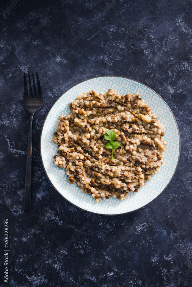 plant-based food, vegan potato and leek buckwheat with lentils and cilantro topping plant-based food, vegan potato and leek buckwheat with lentils and cilantro topping