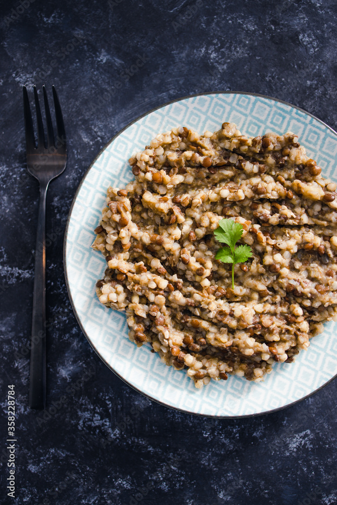plant-based food, vegan potato and leek buckwheat with lentils and cilantro topping plant-based food, vegan potato and leek buckwheat with lentils and cilantro topping