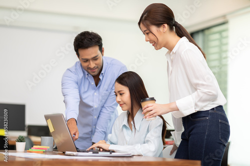 Group of young Startup coworkers working together