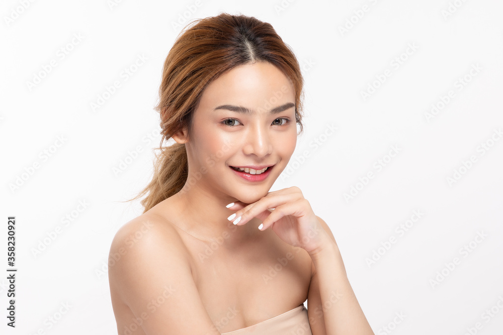 Beautiful Asian woman touching chin smile with clean and fresh skin Beautiful Asian woman touching chin smile with clean and fresh skin