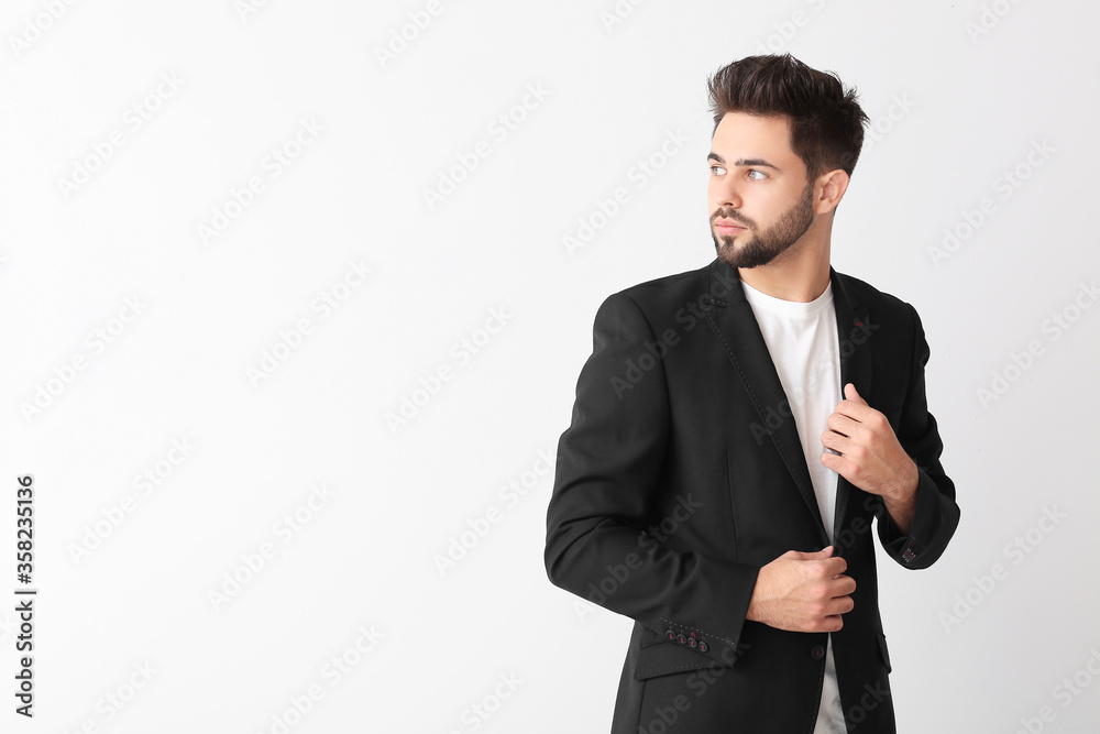 Handsome man with stylish hairdo on white background Handsome man with stylish hairdo on white background