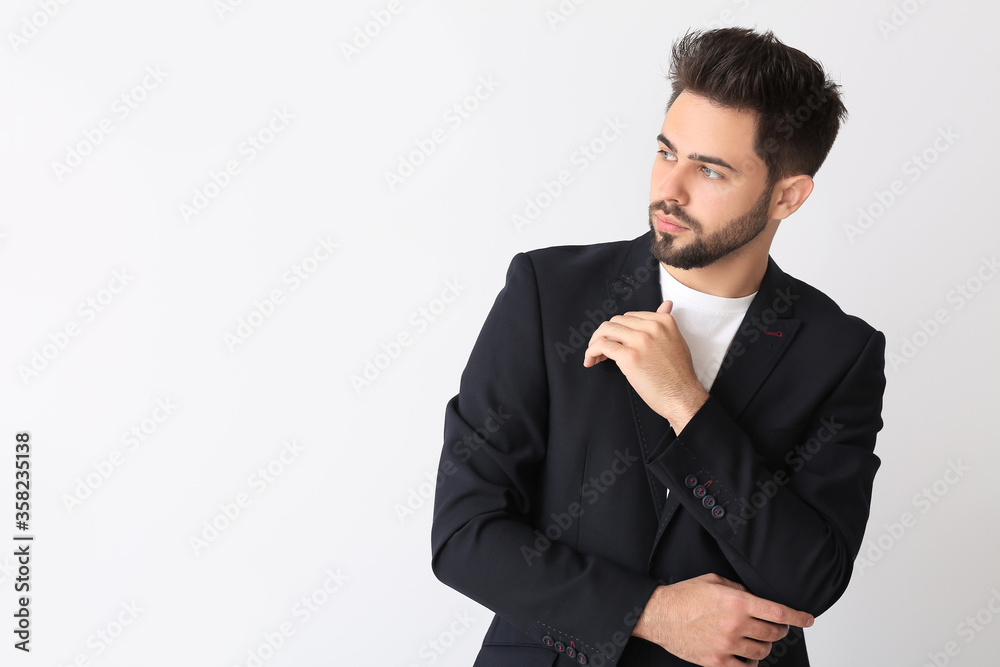 Handsome man with stylish hairdo on white background Handsome man with stylish hairdo on white background