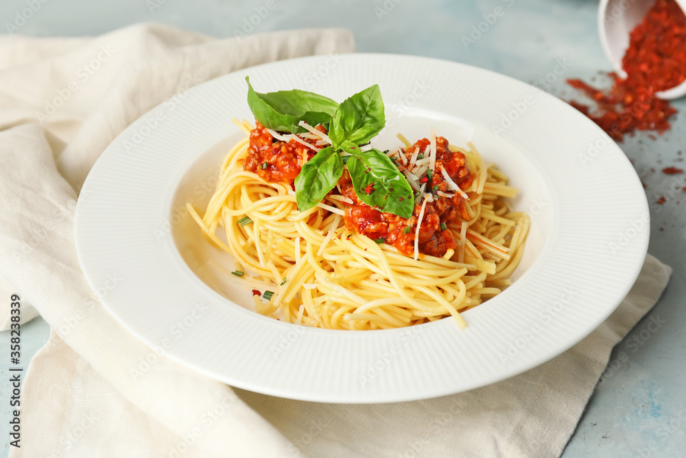 Plate with tasty pasta bolognese on table Plate with tasty pasta bolognese on table