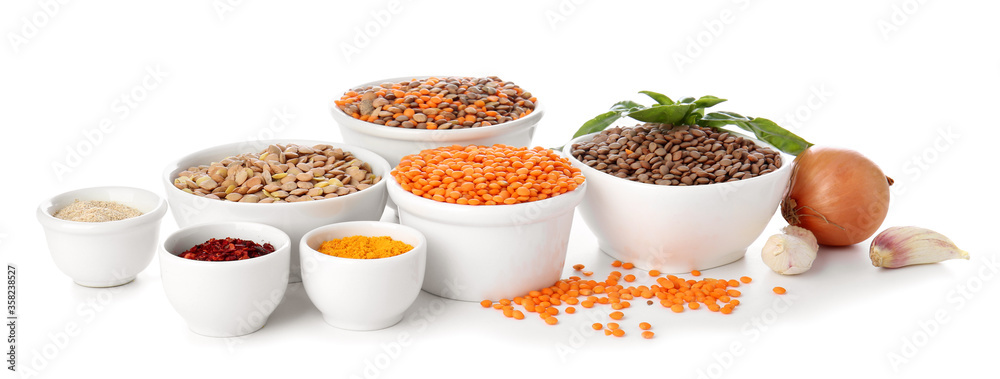Bowls with lentils and spices on white background Bowls with lentils and spices on white background