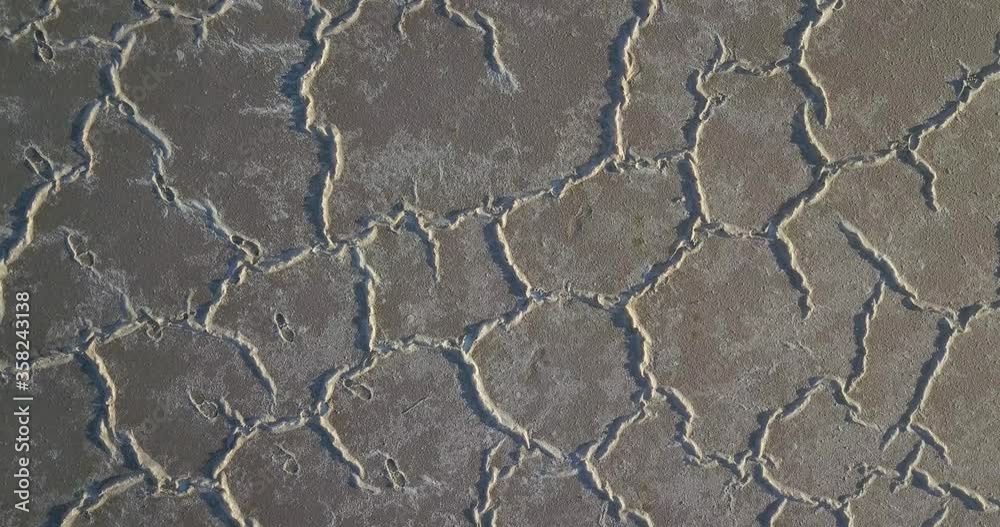 Drone descending towards the patterned surface of Lake Tyrrell Australia Drone descending towards the patterned surface of Lake Tyrrell Australia