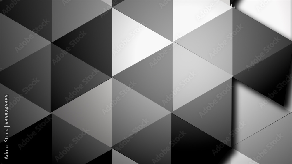 Surface of triangles in different hints of gray turning one by one.