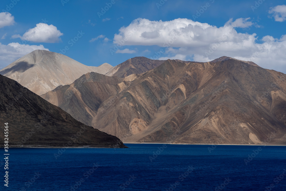 Pangong Tso or Pangong Lake is a lake in the Himalayas situated at a height of about 4,350 m. It is 134 km long and extends from India to the Tibetan Autonomous Region, China.