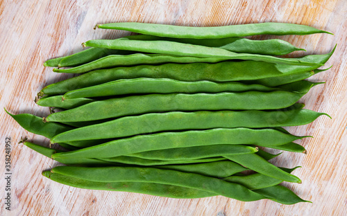 Fresh flat bean pods photo