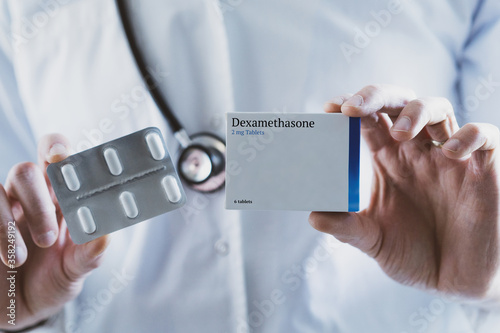 Doctor holding Dexamethasone steroid drug photo