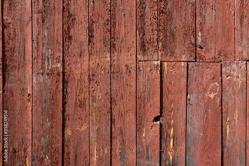 Wooden texture of red color background. Stock photo image of rustic wooden textured wall