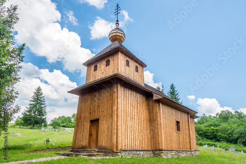 View at the Wooden Church of Ascension of the Lord in village Smigovec, Slovakia