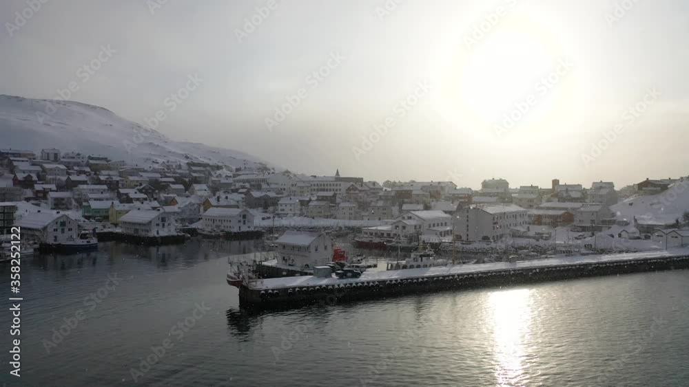 The city of Honningsvag in Norway. Dawn in Honningsvag. Aerial photography in Honningsvag. Norway in the winter.