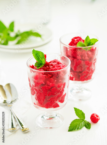 Raspberry sorbet (granite) with champagne. Selective focus