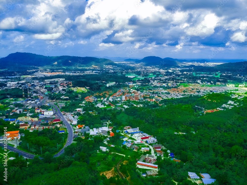 Aerial Drone view of Patong city and beach and Patong Hills