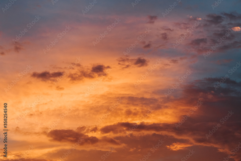 Orange clouds in the sky during sunset