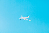 Picture of nice white aircraft plane flying cruise world exploring clear light sky isolated over bright vivid shine vibrant blue color background