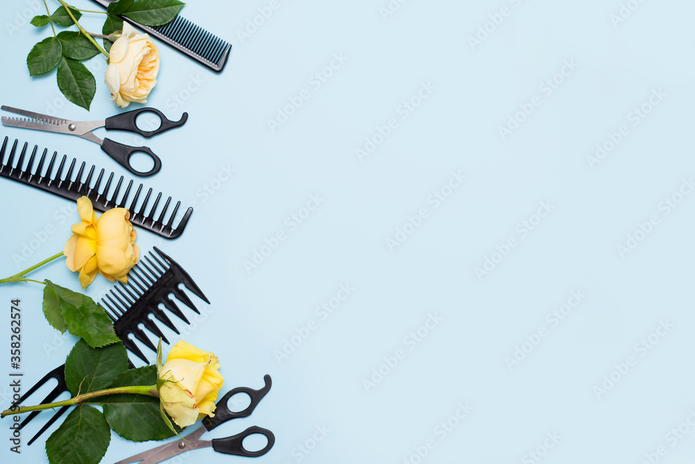 Professional hairdressing equipment - beauty salon and barbershop blue background with copy space