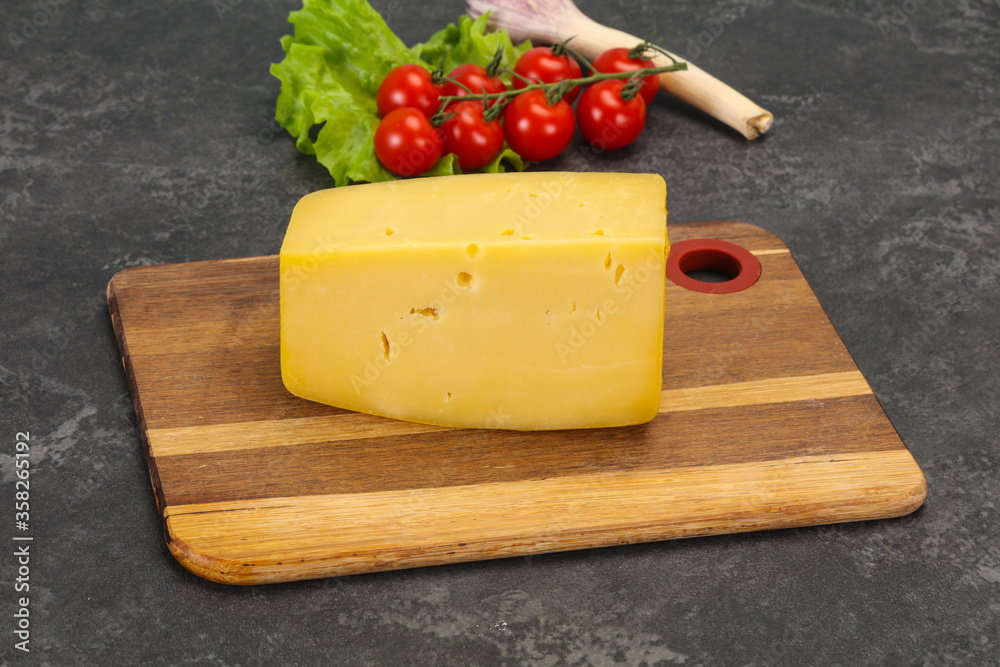 Hard yellow tasty cheese brick Hard yellow tasty cheese brick