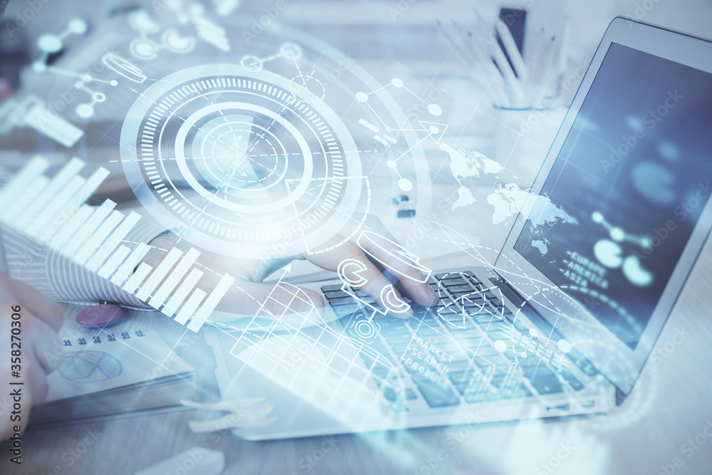 Multi exposure of businessman working on laptop on background. International business hologram in front. Concept of success.
