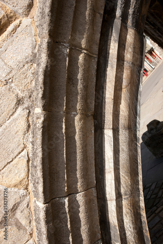 Detail of an arch on Trinity Bridge, 14th Century three-way stone arch bridge, Crowland, Lincolnshire, England - 27th April 2013 photo