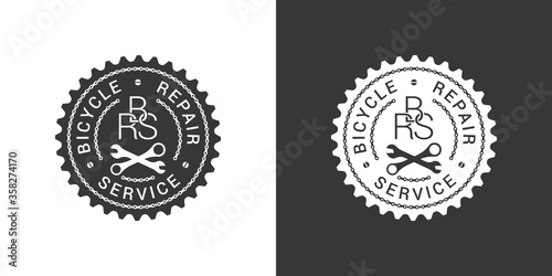 Bicycle repair service logo design with chain links, bike tools and text on chainring silhouette isolated on white and dark grey backgrounds.
