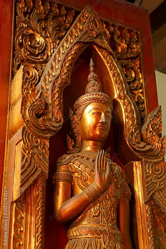 Gold Colored Wooden Sculpture in the Ancient Temple, Ayutthaya Historical Park, Thailand