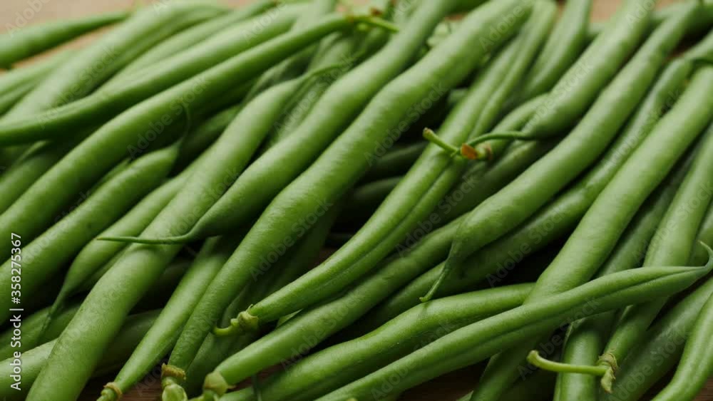 Green fresh beans close up. Food background
Green fresh beans close up. Food background