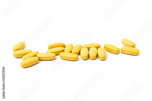 Multivitamin and mutimineral pills, nutritional Supplement on white background in close-up