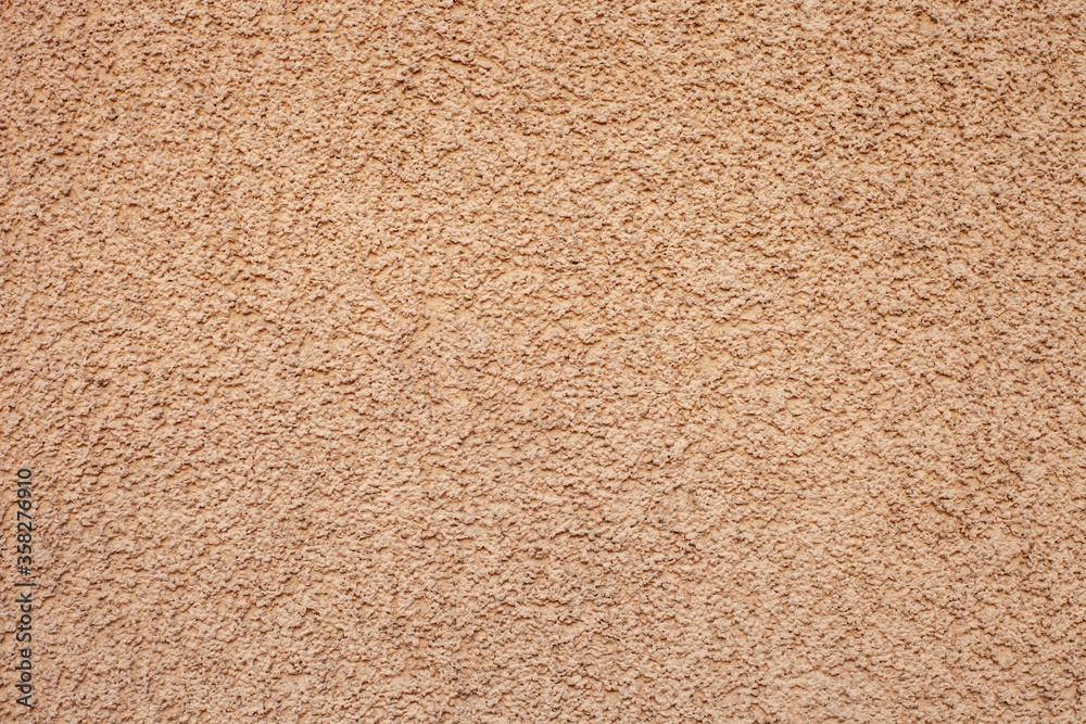 Texture yellow pebble dash stucco facade Texture yellow pebble dash stucco facade