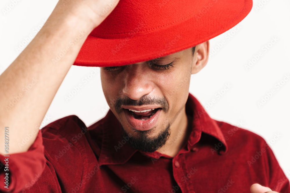 Positive young man wearing hat Positive young man wearing hat