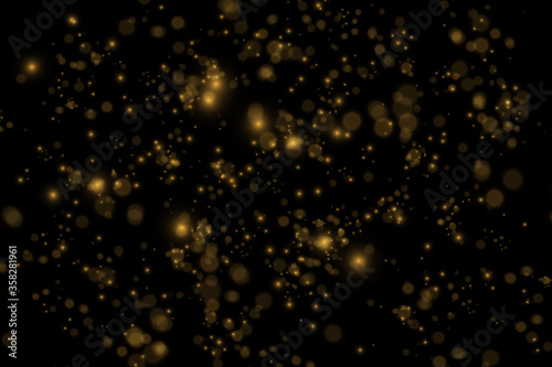 Abstract gold bokeh with black background
