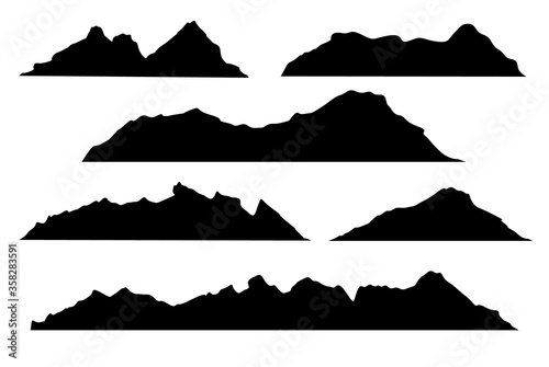 Silhouettes of mountains on a white background.
