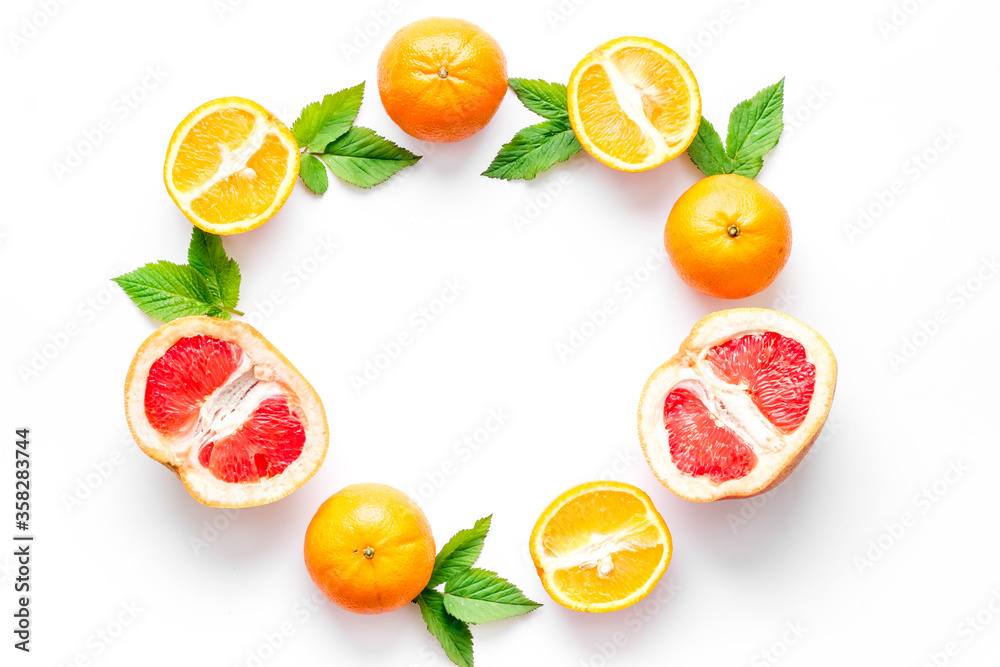 Frame sliced citrus mix white background top view Frame sliced citrus mix white background top view