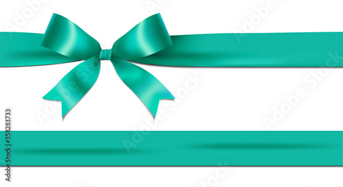 Shiny turquoise ribbon bow isolated on white background with copy space. For using special days. 