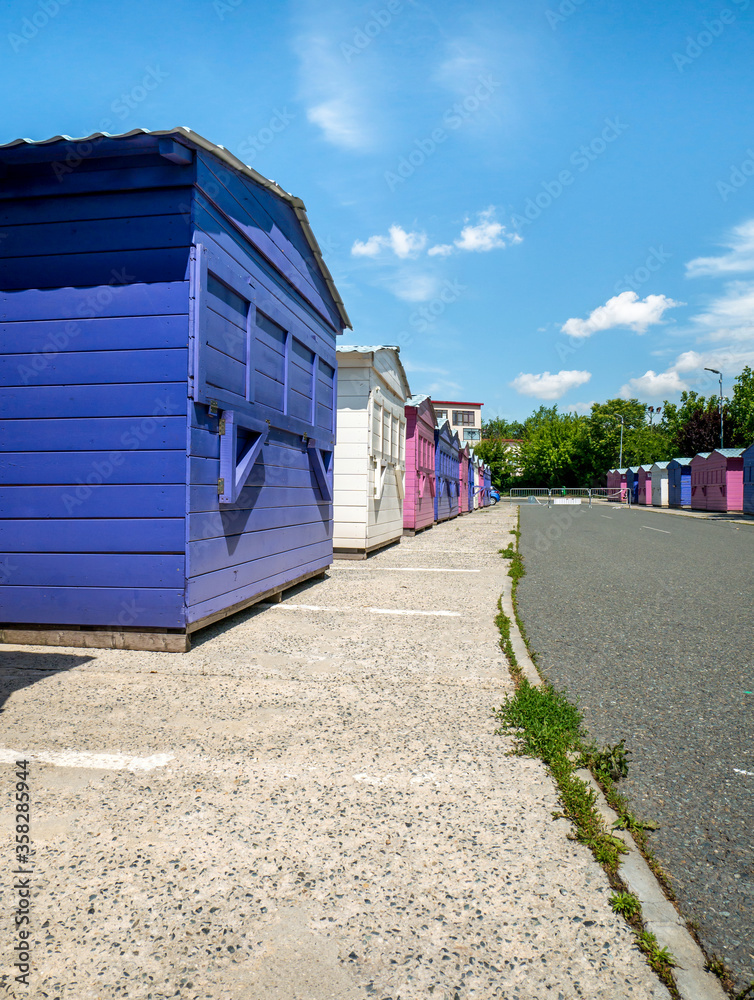 Naklejka premium Colored small wooden houses used as food stands in Children's wo